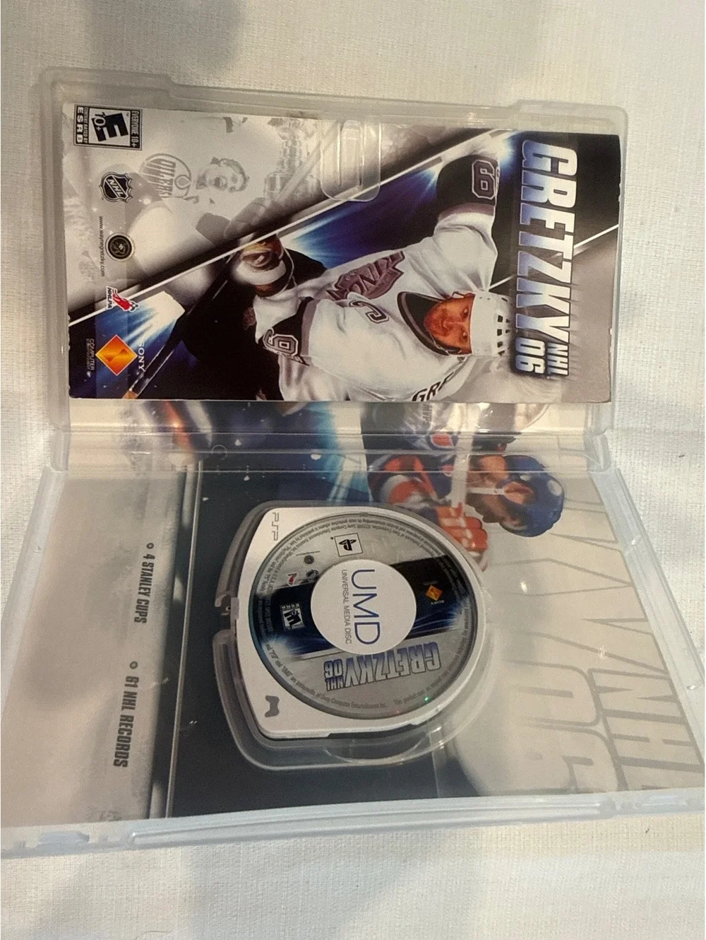 PSP Game Bundle - NFL Street 2 Unleashed, Metal Gear Solid Portable Ops Plus, &